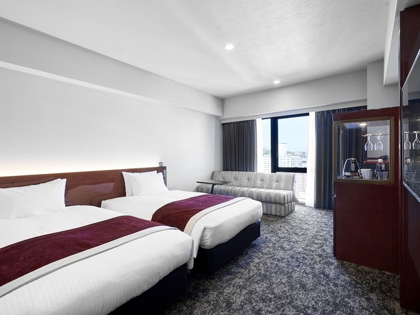 Imagen de la habitación del Hotel Daiwa Roynet KUMAMOTO GINZADORI PREMIER. Foto 8