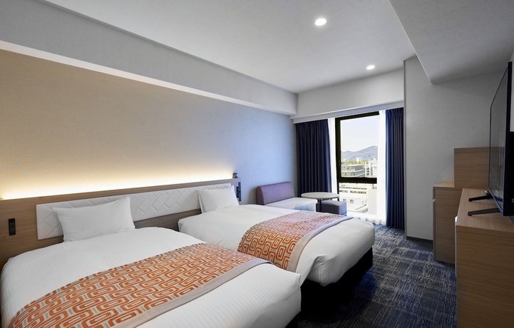 Imagen de la habitación del Hotel Daiwa Roynet KUMAMOTO GINZADORI PREMIER. Foto 10