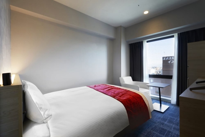 Imagen de la habitación del Hotel Daiwa Roynet KUMAMOTO GINZADORI PREMIER. Foto 12