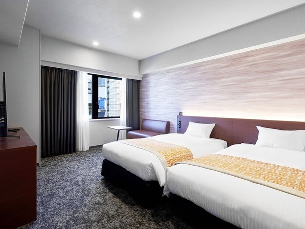 Imagen de la habitación del Hotel Daiwa Roynet KUMAMOTO GINZADORI PREMIER. Foto 17