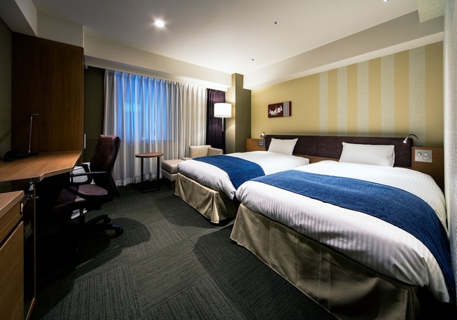 Imagen de la habitación del Hotel Daiwa Roynet Kokura Ekimae. Foto 12