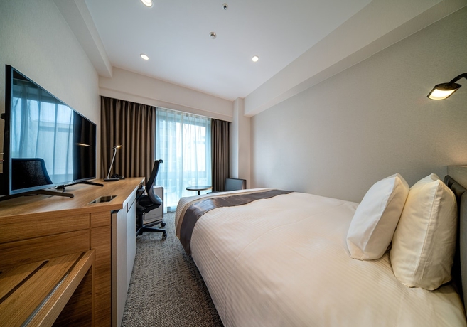 Imagen de la habitación del Hotel Daiwa Roynet Kumamoto. Foto 8