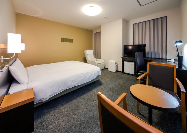 Imagen de la habitación del Hotel Daiwa Roynet Nagoya Shinkansenguchi. Foto 10