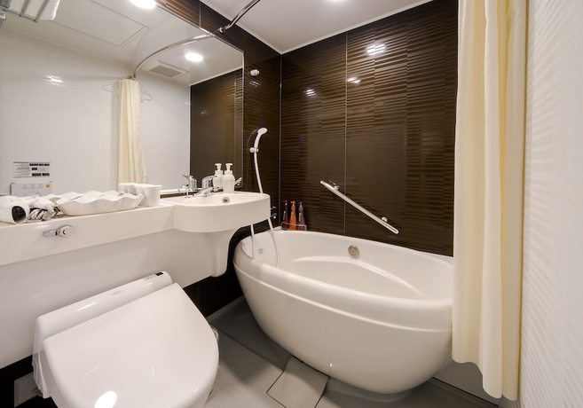 Imagen de la habitación del Hotel Daiwa Roynet Nagoya Shinkansenguchi. Foto 12