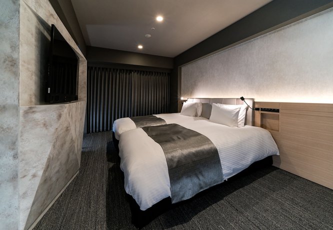 Imagen de la habitación del Hotel Daiwa Roynet Nishi Shinjuku Premier. Foto 13