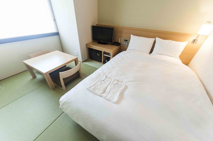 Imagen de la habitación del Hotel Daiwa Roynet Okinawa Kenchomae. Foto 5