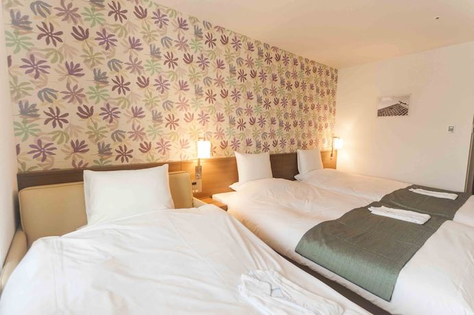 Imagen de la habitación del Hotel Daiwa Roynet Okinawa Kenchomae. Foto 8