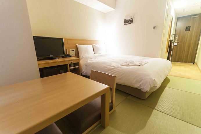 Imagen de la habitación del Hotel Daiwa Roynet Okinawa Kenchomae. Foto 12