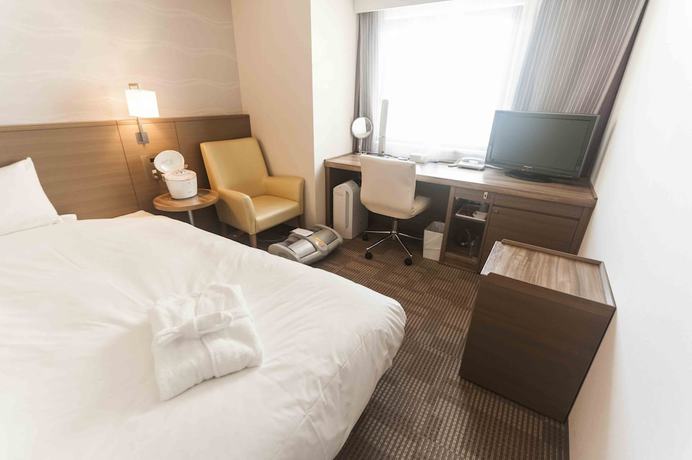 Imagen de la habitación del Hotel Daiwa Roynet Okinawa Kenchomae. Foto 15