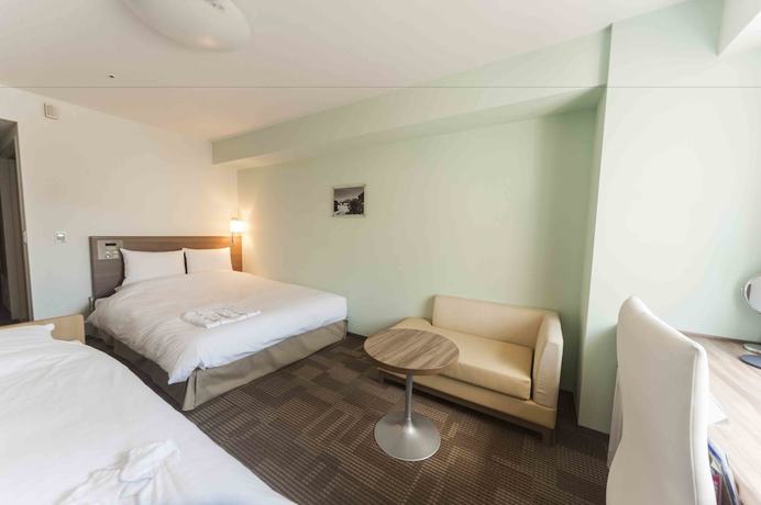 Imagen de la habitación del Hotel Daiwa Roynet Okinawa Kenchomae. Foto 16