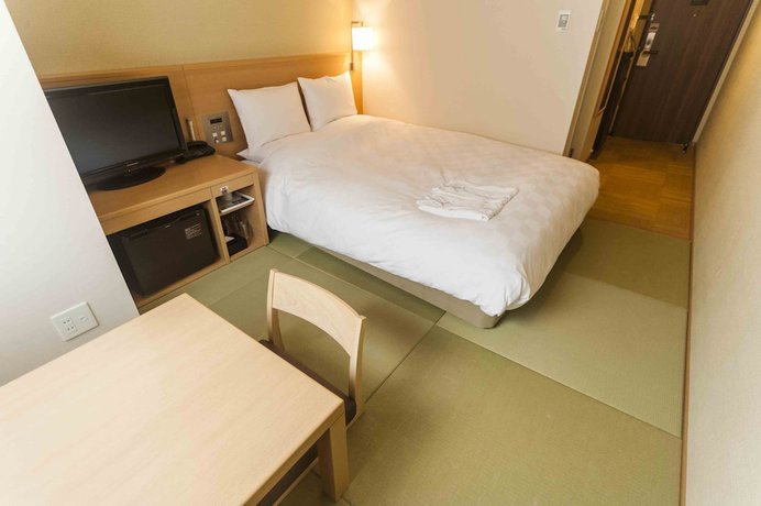 Imagen de la habitación del Hotel Daiwa Roynet Okinawa Kenchomae. Foto 18