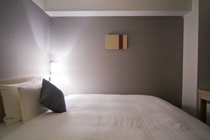 Imagen de la habitación del Hotel Daiwa Roynet Osaka Uehonmachi. Foto 9