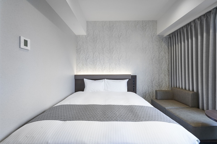 Imagen de la habitación del Hotel Daiwa Roynet Sapporo Nakajima Koen. Foto 10