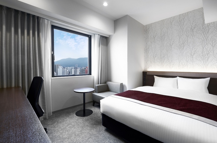 Imagen de la habitación del Hotel Daiwa Roynet Sapporo Nakajima Koen. Foto 12
