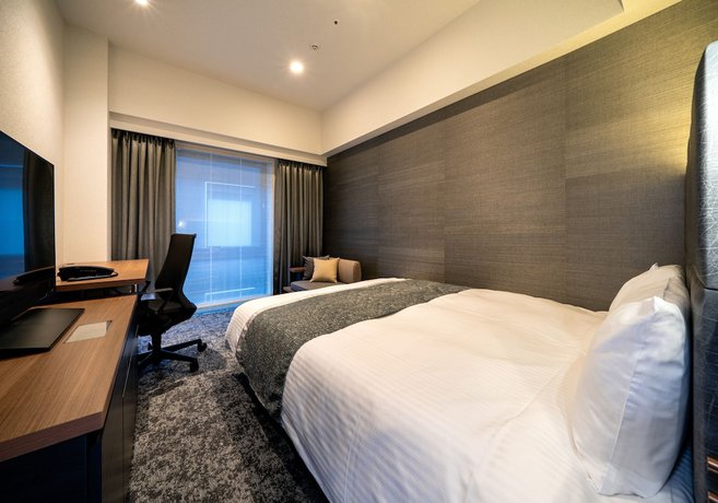 Imagen de la habitación del Hotel Daiwa Roynet Tokyo Kyobashi. Foto 12