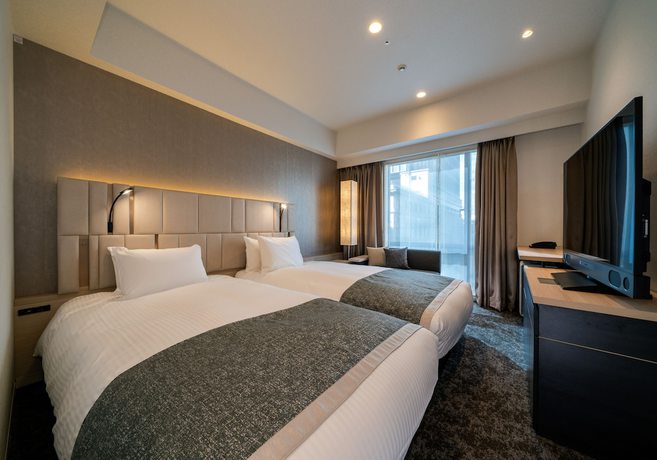 Imagen de la habitación del Hotel Daiwa Roynet Tokyo Kyobashi. Foto 13
