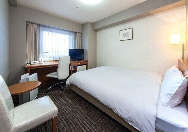 Imagen de la habitación del Hotel Daiwa Roynet Toyama. Foto 11
