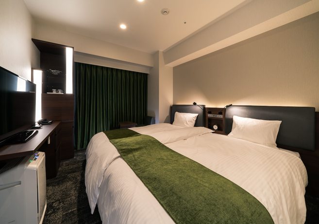 Imagen de la habitación del Hotel Daiwa Roynet Toyama Station. Foto 3