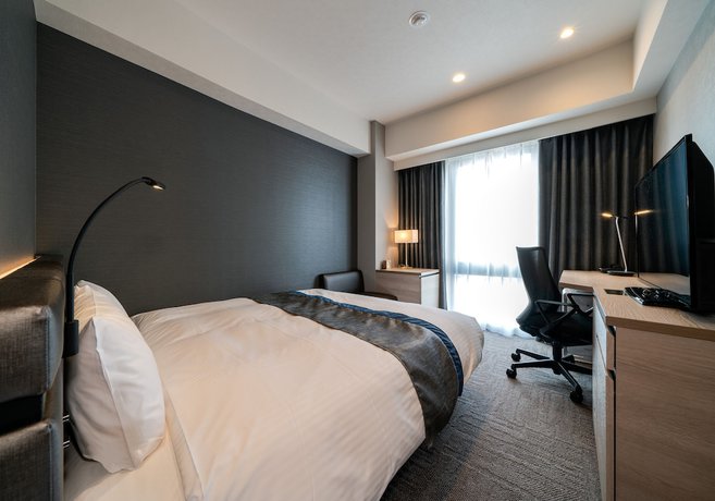 Imagen de la habitación del Hotel Daiwaroynethotel Sendai Ichibanchou Premier. Foto 5