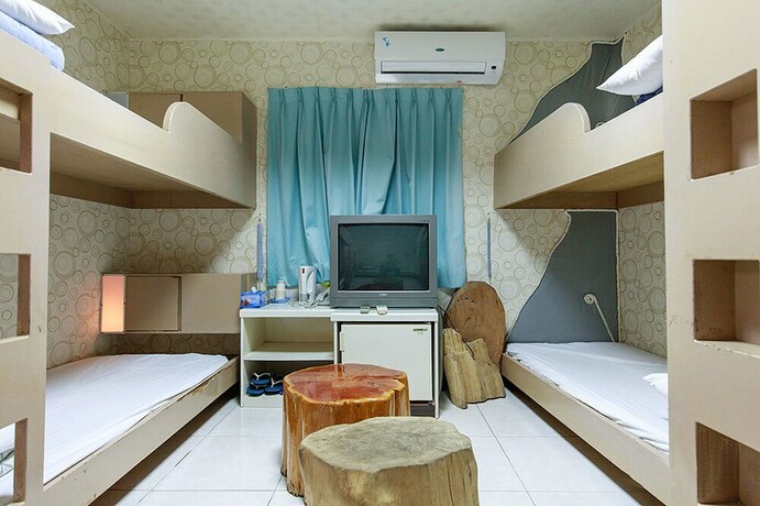 Imagen de la habitación del Hotel Dajenshan Hotel. Foto 11