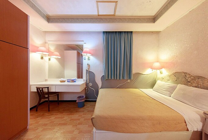 Imagen de la habitación del Hotel Dajenshan Hotel. Foto 15