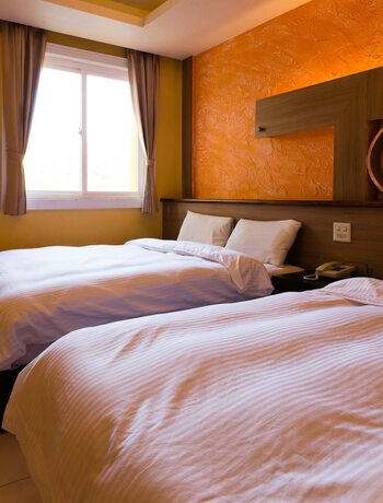 Imagen de la habitación del Hotel Dajenshan Hotel. Foto 16