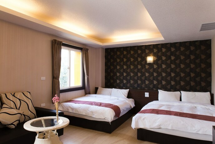 Imagen de la habitación del Hotel Dajenshan Hotel. Foto 17
