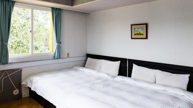 Imagen de la habitación del Hotel Dajenshan Hotel. Foto 24
