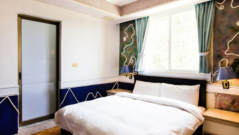 Imagen de la habitación del Hotel Dajenshan Hotel. Foto 26