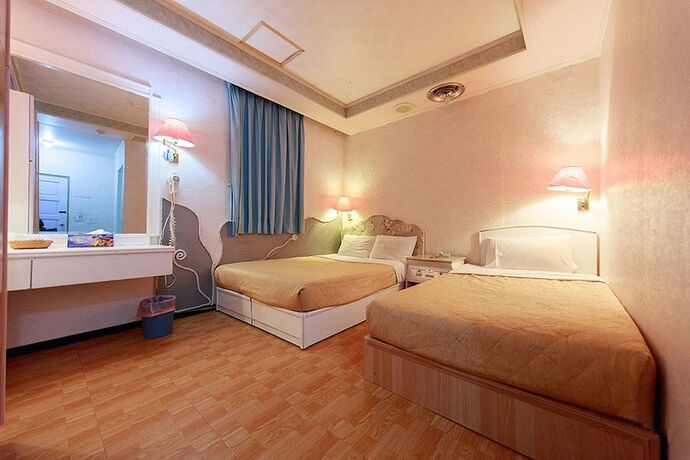 Imagen de la habitación del Hotel Dajenshan Hotel. Foto 28