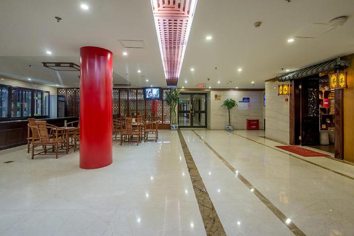 Imagen del bar/restaurante del Hotel Dajiaoting International Business Hotel. Foto 2