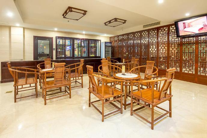 Imagen del bar/restaurante del Hotel Dajiaoting International Business Hotel. Foto 3