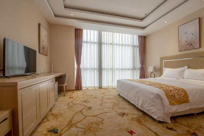 Imagen de la habitación del Hotel Dajiaoting International Business Hotel. Foto 8