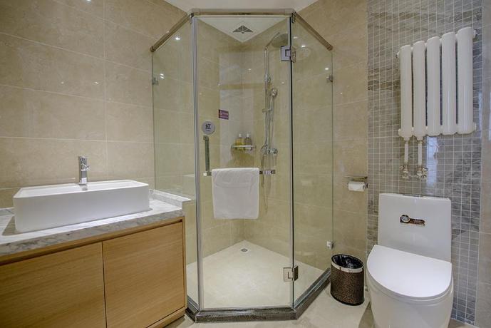Imagen de la habitación del Hotel Dajiaoting International Business Hotel. Foto 9