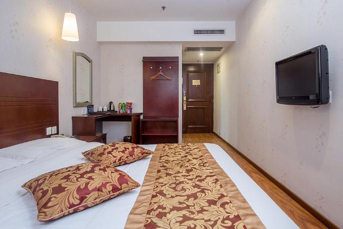 Imagen de la habitación del Hotel Dajiaoting International Business Hotel. Foto 10