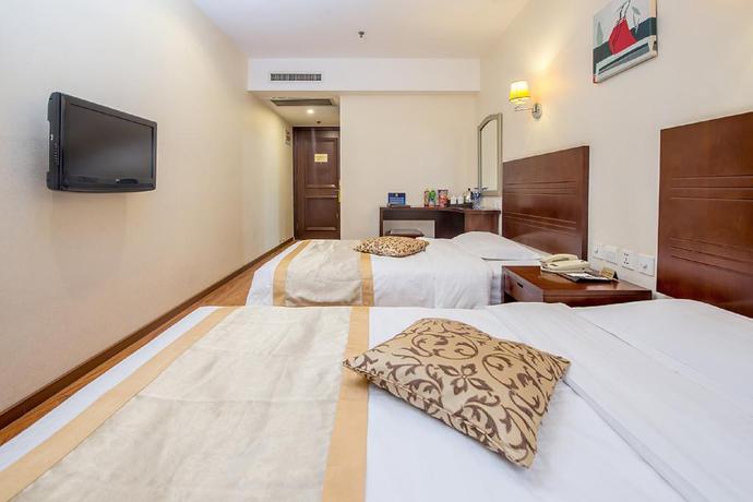 Imagen de la habitación del Hotel Dajiaoting International Business Hotel. Foto 12