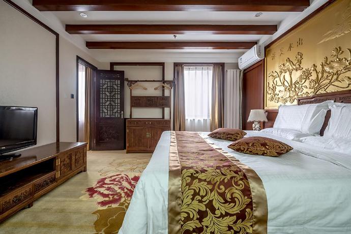 Imagen de la habitación del Hotel Dajiaoting International Business Hotel. Foto 14