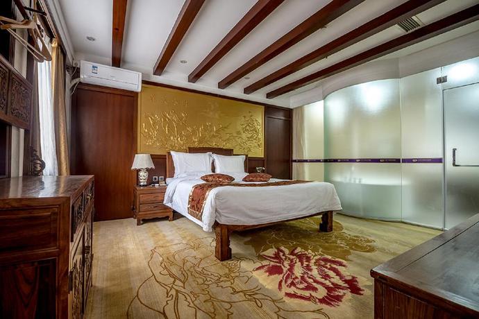 Imagen de la habitación del Hotel Dajiaoting International Business Hotel. Foto 16