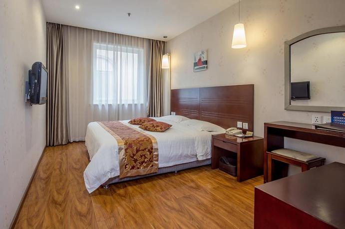 Imagen de la habitación del Hotel Dajiaoting International Business Hotel. Foto 19