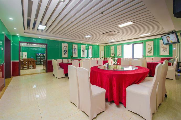 Imagen del bar/restaurante del Hotel Dajiaoting International Business Hotel. Foto 6