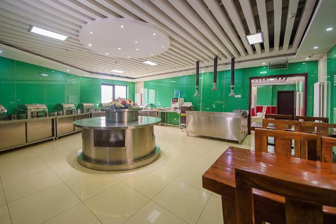 Imagen del bar/restaurante del Hotel Dajiaoting International Business Hotel. Foto 7