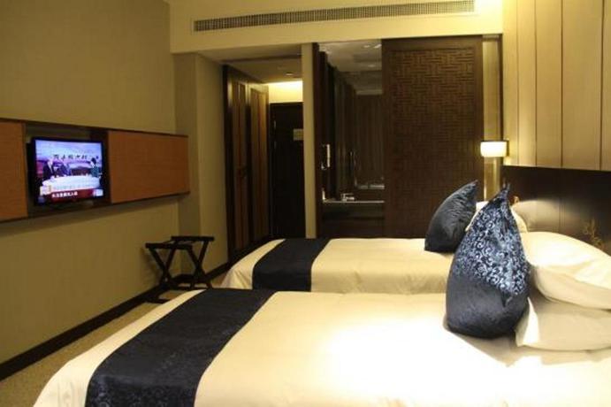 Imagen de la habitación del Hotel Dajiuhua Hotel - Chizhou. Foto 5