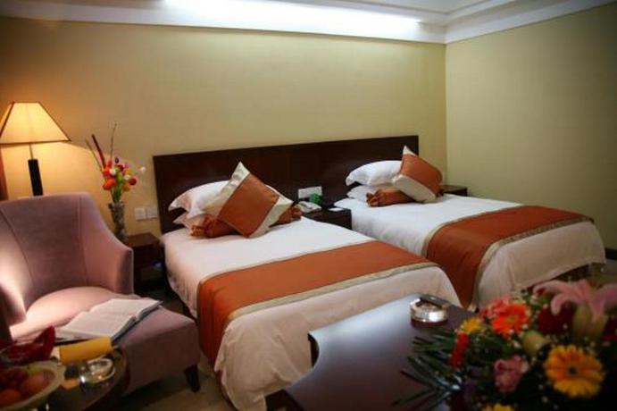 Imagen de la habitación del Hotel Dajiuhua Hotel - Chizhou. Foto 6
