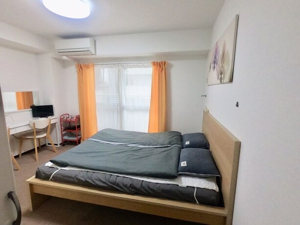 Imagen de la habitación del Hotel Dajoko House. Foto 30