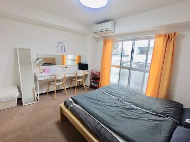 Imagen de la habitación del Hotel Dajoko House. Foto 32