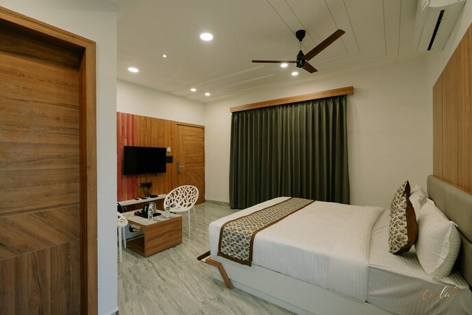 Imagen de la habitación del Hotel Daksh Eden Greenz -a Luxury Resort. Foto 18