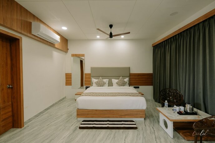 Imagen de la habitación del Hotel Daksh Eden Greenz -a Luxury Resort. Foto 20