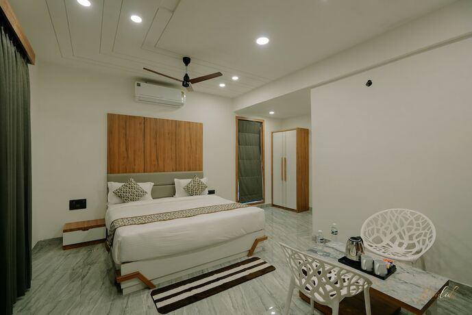 Imagen de la habitación del Hotel Daksh Eden Greenz -a Luxury Resort. Foto 21