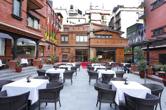 Imagen del bar/restaurante del Hotel Dalai-la Boutique. Foto 2