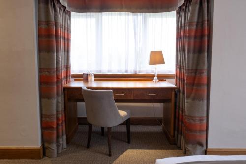 Imagen de la habitación del Hotel Dale Hill Hotel. Foto 17